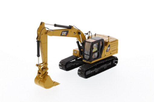 Cat Diecast 323 Hydraulic Excavator with 4 new work-tools - Next Generation 85657 - Image 2