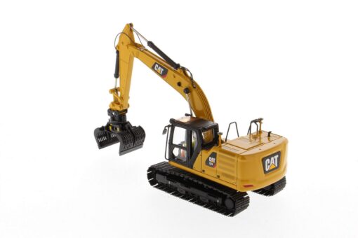 Cat Diecast 323 Hydraulic Excavator with 4 new work-tools - Next Generation 85657 - Image 3