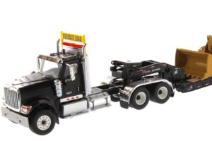 International Diecast HX520 Tandem Black with XL120 Trailer and Cat 963K Track Loader 85599