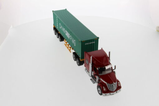 International 1:50 Diecast LoneStar Sleeper Cab with Skeleton Trailer and 40' Dry Goods Sea Container - Red tractor + Safety yellow skeleton + China Shipping container 71045 - Image 2