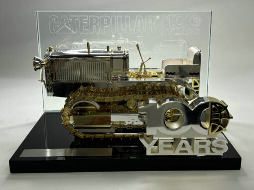 FRONT VIEW OF 85689 PREMIUM CENTENARY MODEL. GOLD/SILVER ON BASE DISPLAY WITH 100 YEAR LOGO