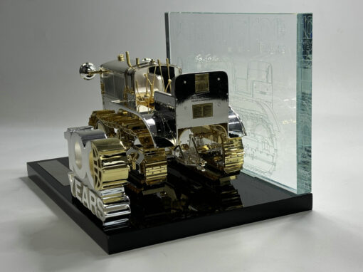 BACK VIEW OF 85689 PREMIUM CENTENARY MODEL. GOLD/SILVER ON BASE DISPLAY WITH 100 YEAR LOGO