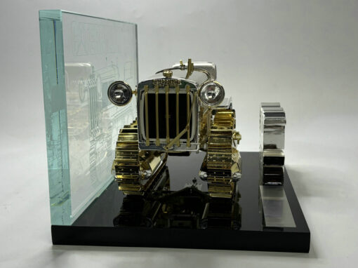 SIDE VIEW OF 85689 PREMIUM CENTENARY MODEL. GOLD/SILVER ON BASE DISPLAY WITH 100 YEAR LOGO